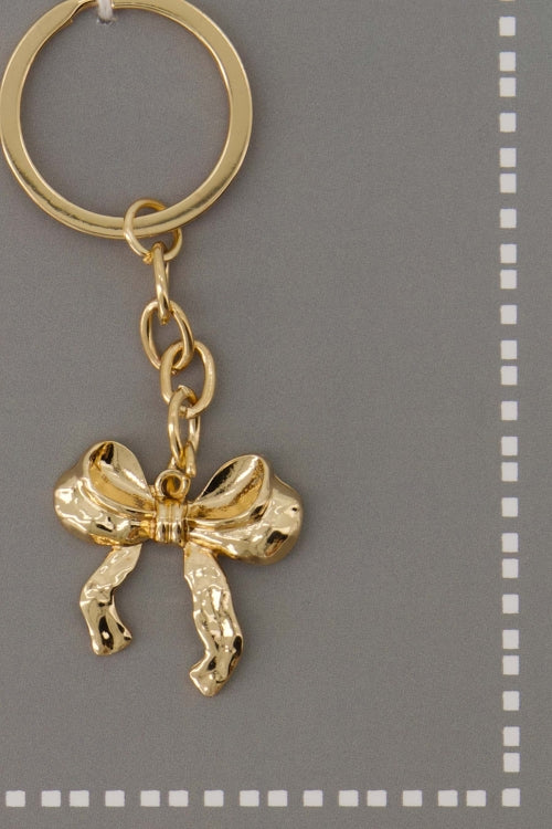 Ansichtkaart sleutelhanger strik wit/goud