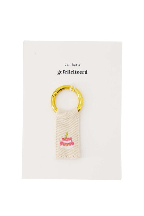 Ansichtkaart sleutelhanger taart wit/roze