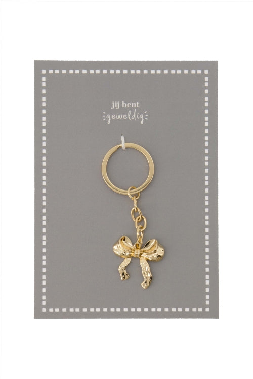 Ansichtkaart sleutelhanger strik wit/goud