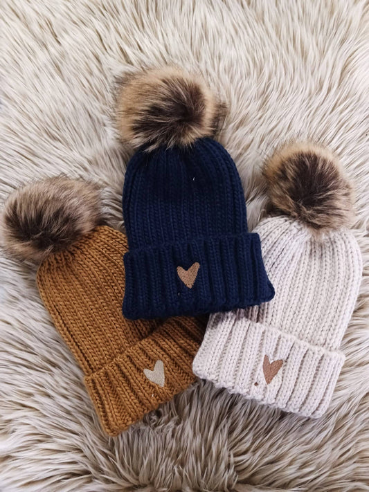 Pompon muts hartje
